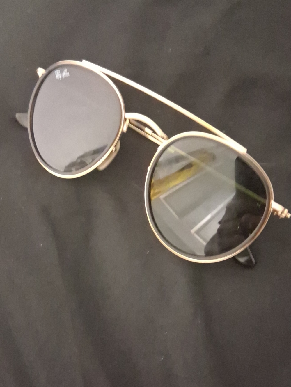 Ray-Ban Round Metal Sunglasses in Gold with Dark Lenses